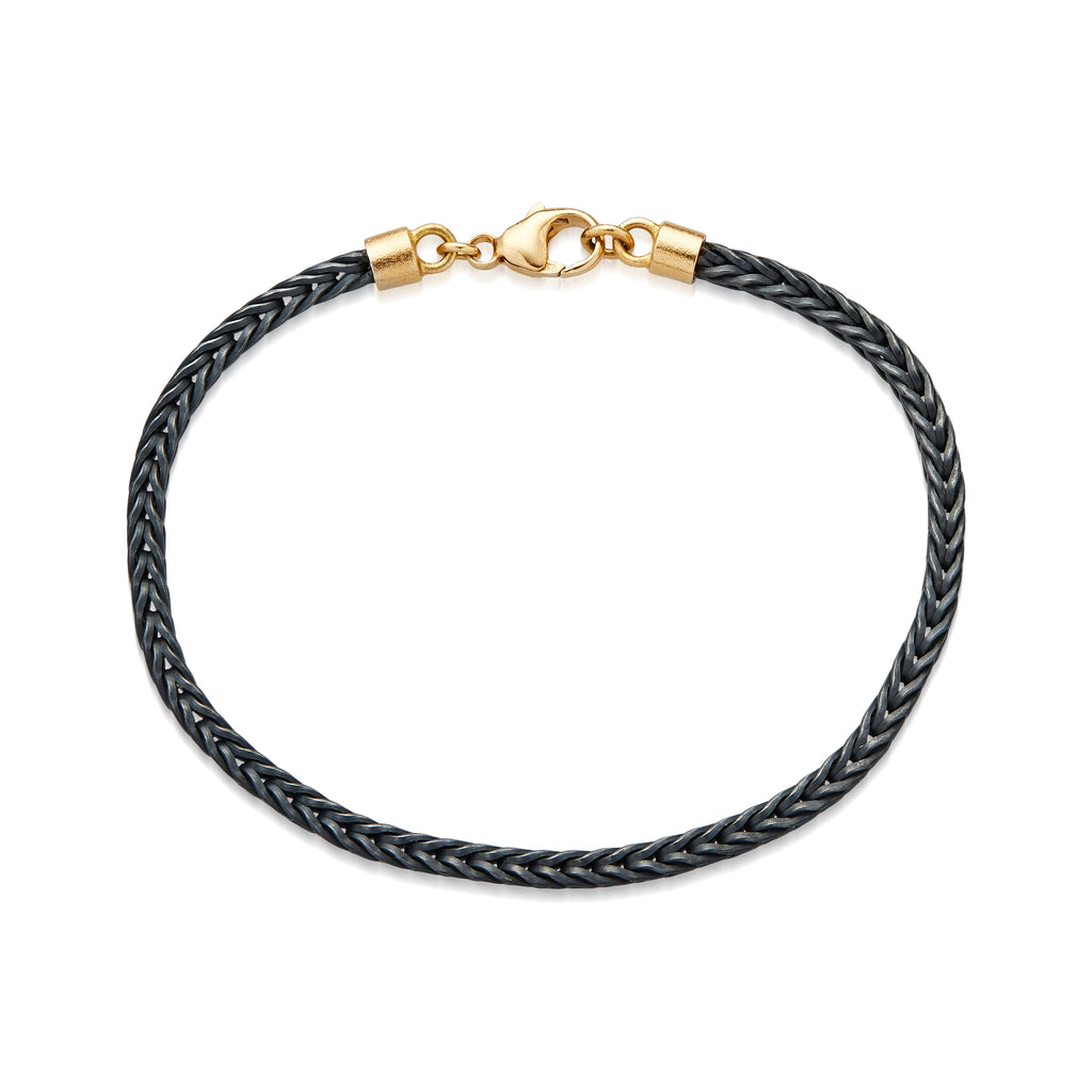 Armbånd med 18 kt guld lås